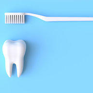 Zahn und Zahnbürste